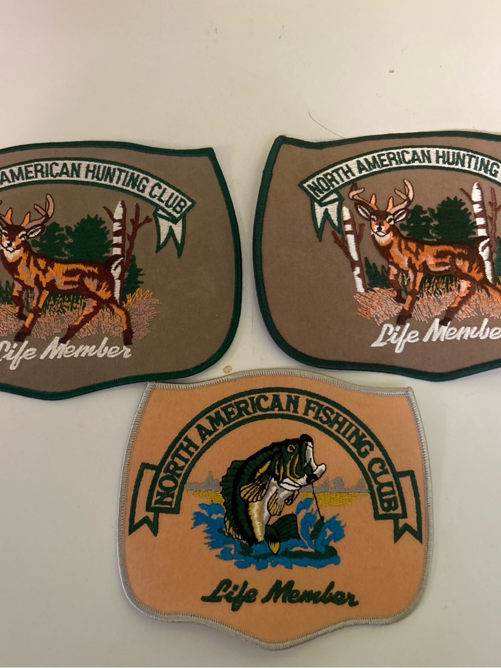 North American Hunting & Fishing Club Life Member Patch Trio - Brown, Tan, Green